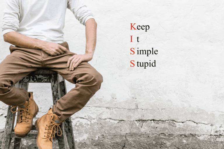 A man sitting on a stool with the words keep it simple stocks.